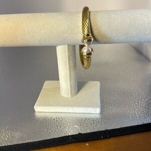 Joan Rivers clamper bracelet signed by Joan Rivers. Absolutely gorgeous gold.​​